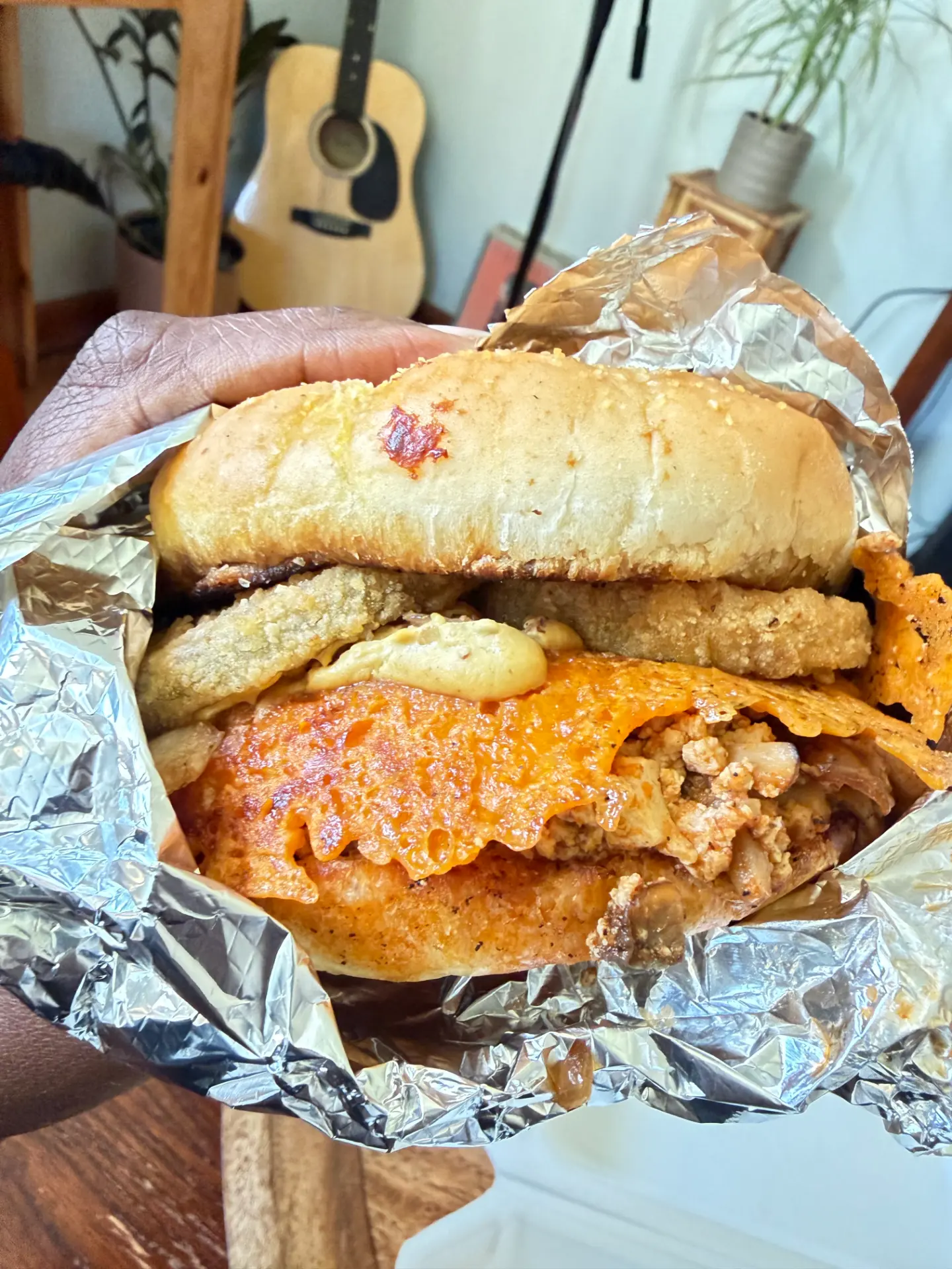 Crispy fried sandwich with melty cheese and savory filling