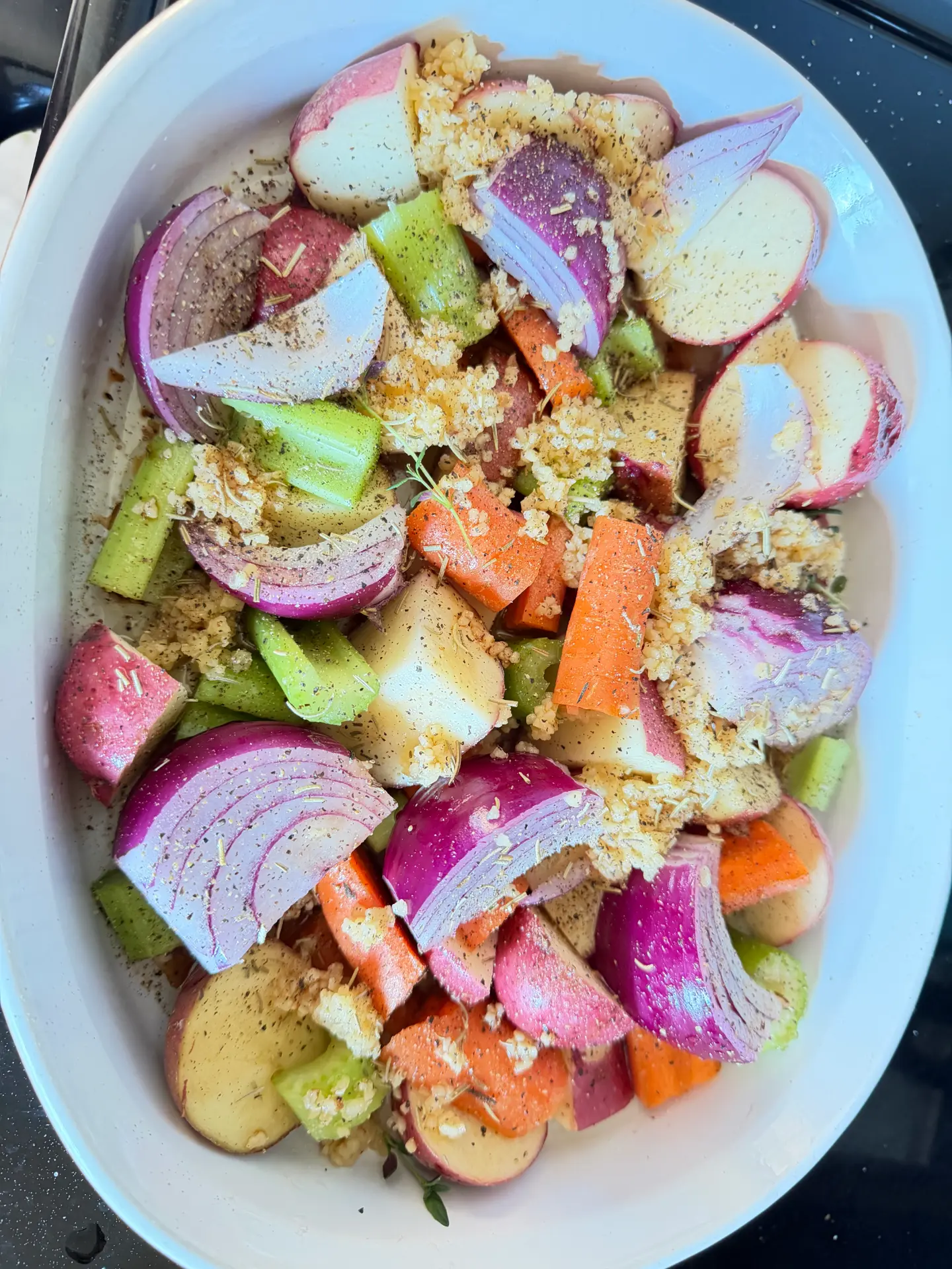Roasted potatoes, red onions, carrots and celery with herbs