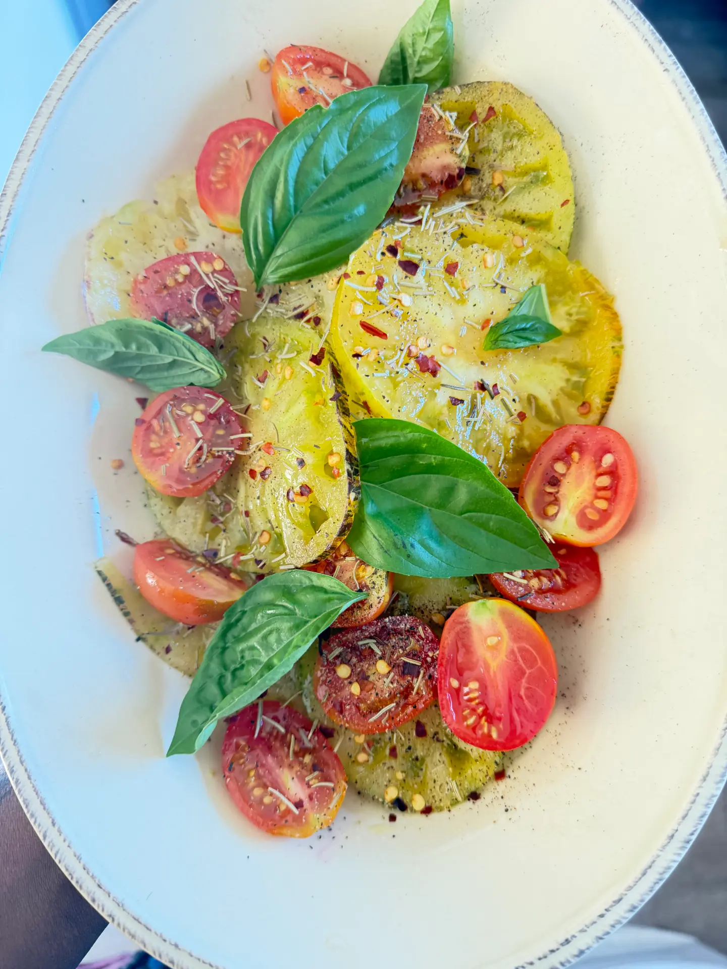 Heirloom tomato salad with cherry tomatoes and fresh basil