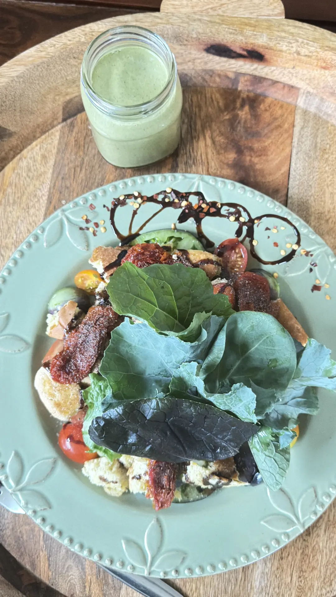 Seasonal salad plate with green herb dressing